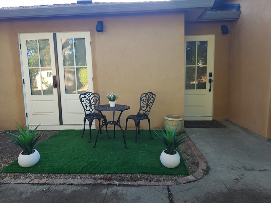 Private outdoor cafe to step into from the living room French doors.