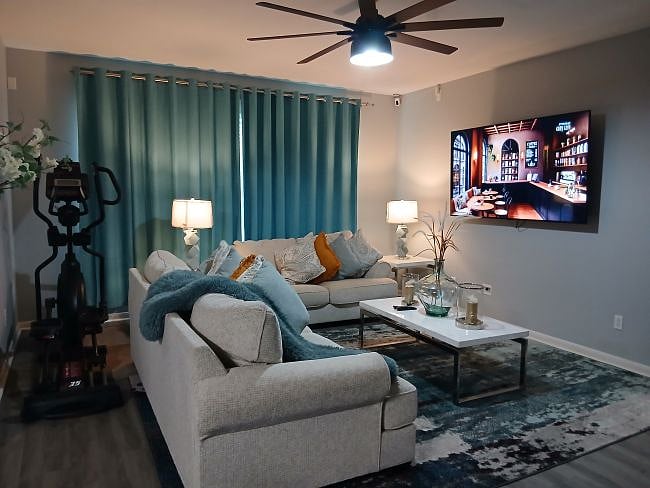 Living Room with Exercise Elliptical Machine