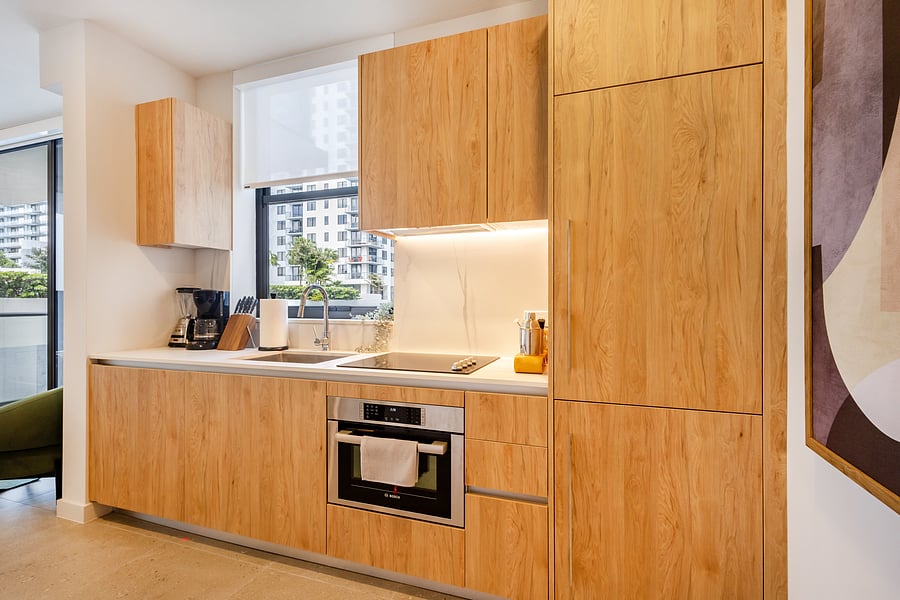 Full kitchen with convection oven, stovetop, blender and coffee maker