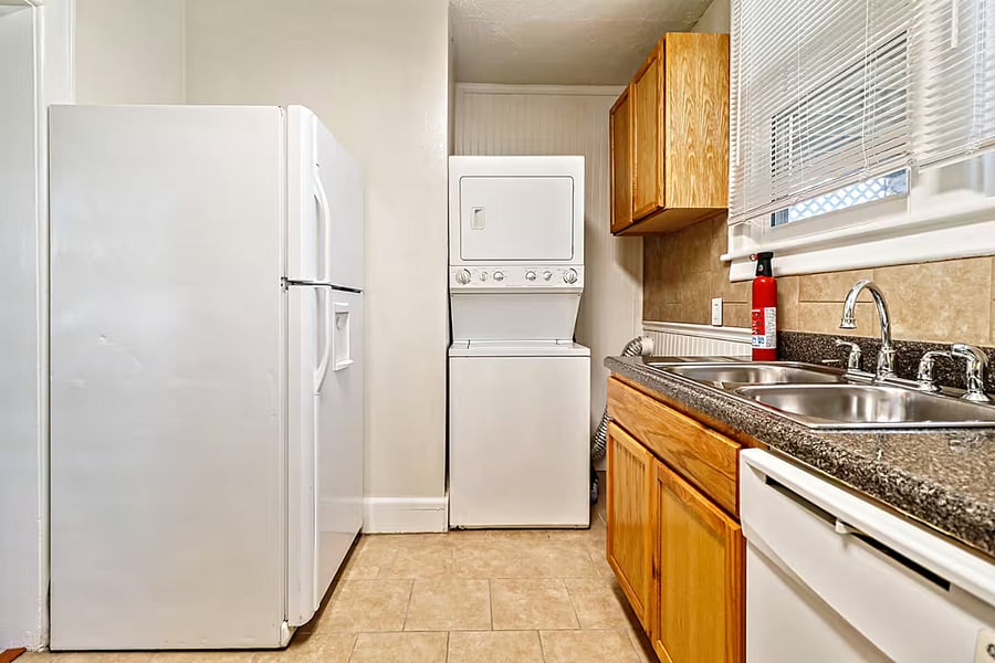Another photo of the kitchen. Washer/dryer and 18 cubic foot refrigerator provided