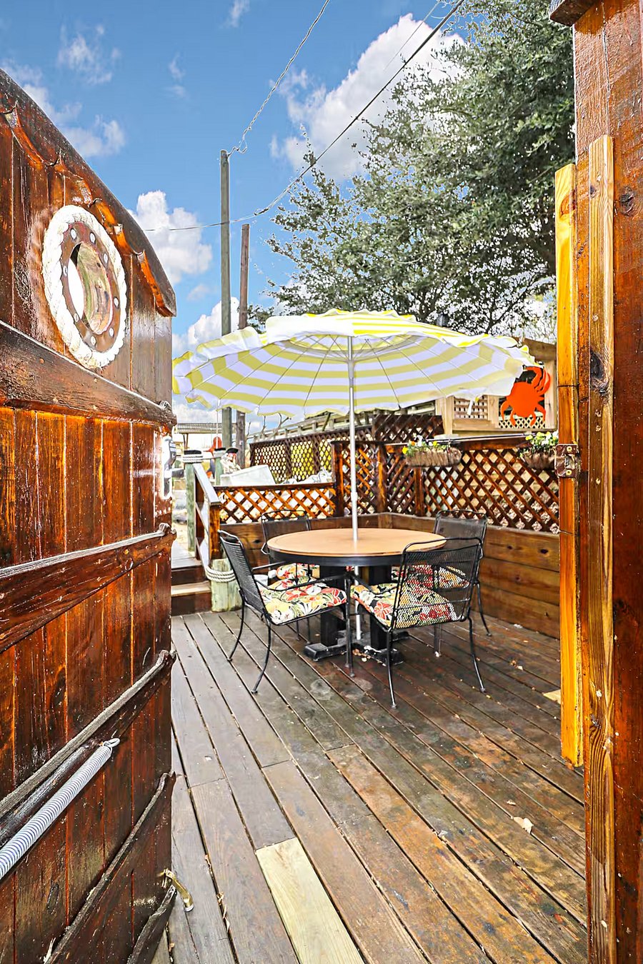 Through this gate leads you to the Chesapeake Bay, the Beach, Water Fountain of Poseidon, Outdoor kitchen with gas grill/sink with running water/fish cleaning area/seating, Bocce Ball Court, Horseshoe Pit, Beach Front Pergola with Hot Tub