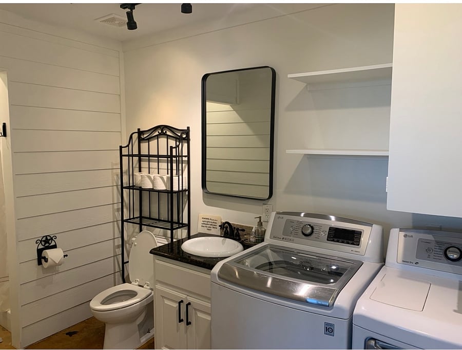 Downstairs bathroom with shower. Washer and dryer.