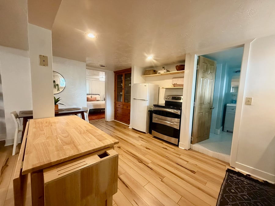 Full kitchen with charming built-in hutch original to the historic home