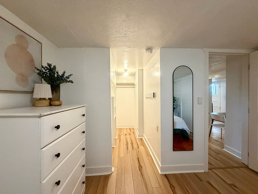 Large walk-in closet with built-in shelving