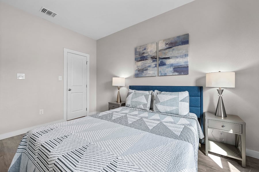secondary bedroom with own bathroom - queen bed, dresser, room darkening shades or blackout curtains on request