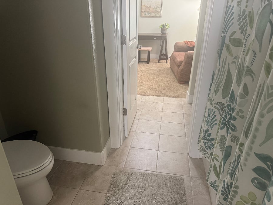 Toilet and shower in Jack and Jill bathroom