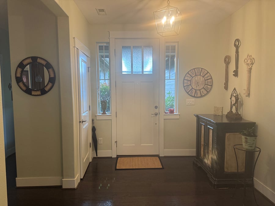 Front entrance.  Your wing is to the left by the mirror