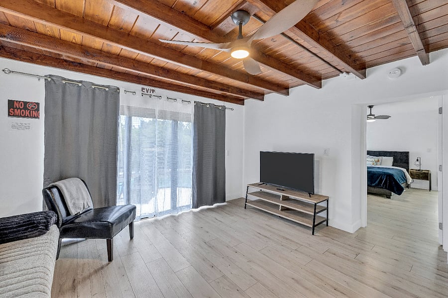 Living room and TV with books