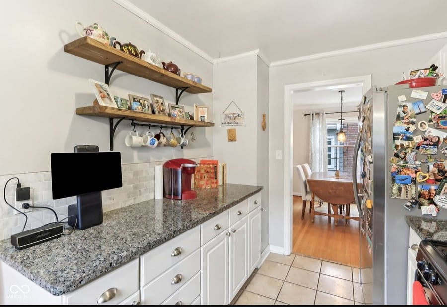 Generous quartz countertop for meal prepping. Coffee bar is at the corner.