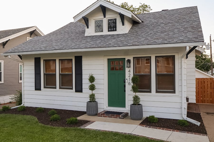 From the moment you arrive, The Boxwood Bungalow welcomes you with classic bungalow architecture, a signature green front door, and thoughtfully landscaped gardens.
Enjoy the convenience of parking just steps from the front door!