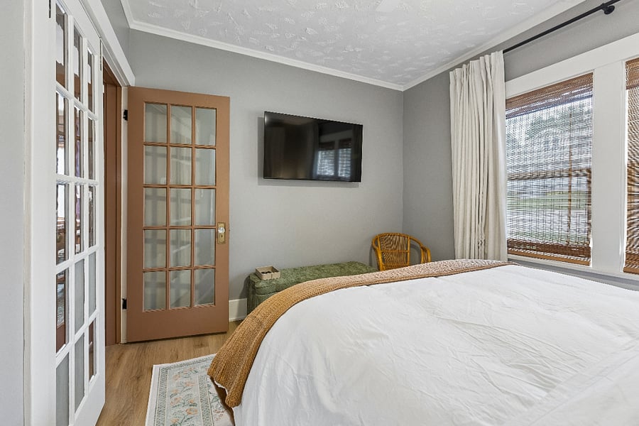 The bedroom features a queen bed with premium Marriott bedding and a 55-inch Smart TVperfect for winding down after a day exploring Omaha.