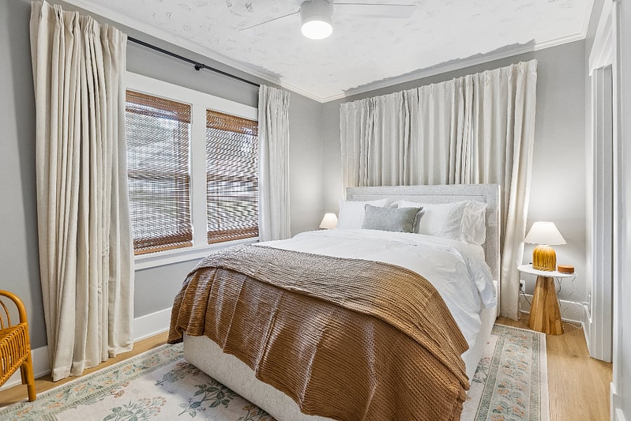 Unwind in the inviting bedroom with a queen bed, Marriott bedding, blackout curtains, and soft linens for a restful night's sleep