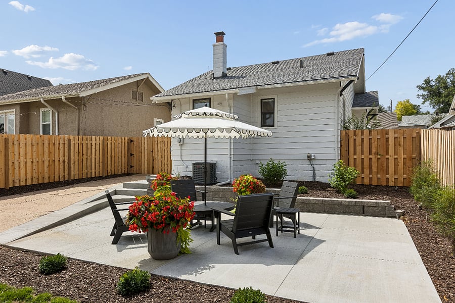 Seasonal flowers and fresh landscaping create a welcoming outdoor space throughout the warmer months