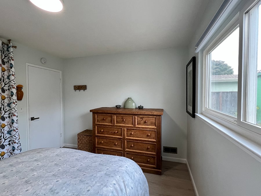 Bedroom 1 includes a huge reclaimed wood dresser, hamper, and a large closet with storage.V