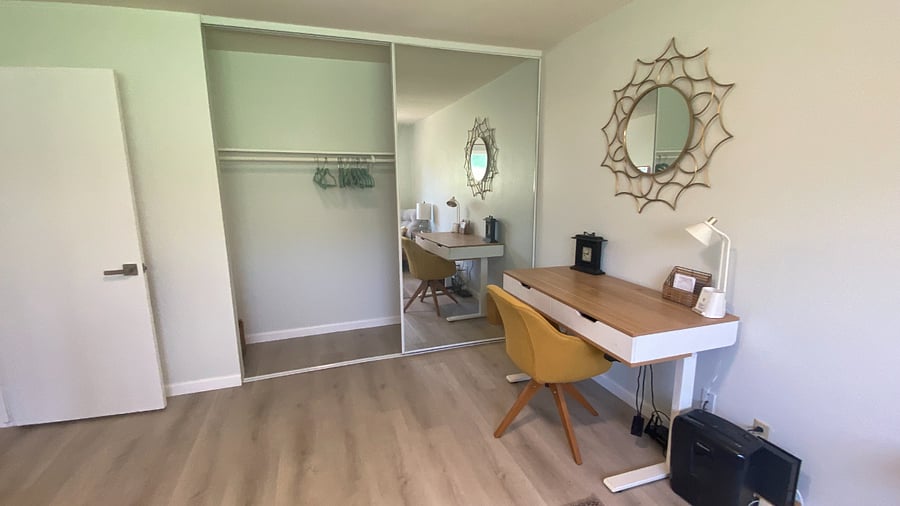 Bedroom 2/Office: Large mirrored closet with hangers