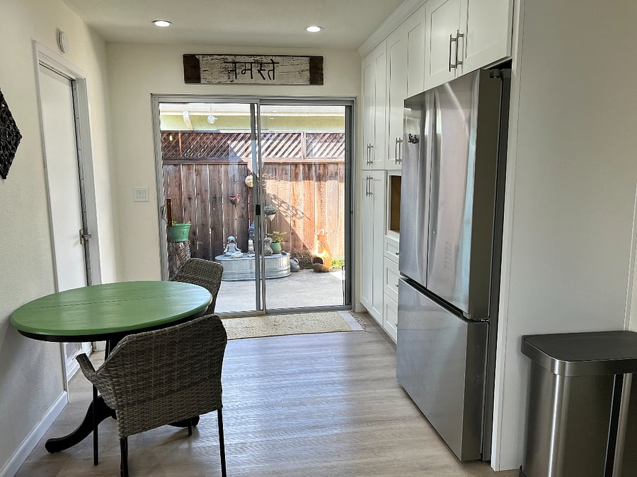 Dining room with refrigerator and small appliances, and tons of storage