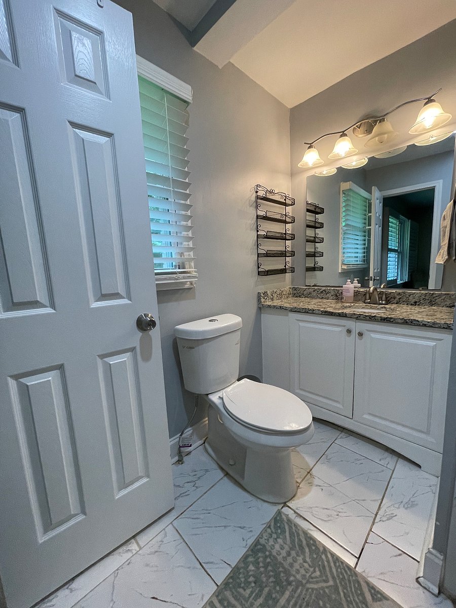plenty of storage for your toiletries on the wall shelf and under the sink