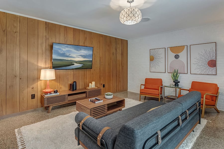 Original accents include paneling, exposed brick, terrazzo flooring, perfect for the Mid Century vibe.  
