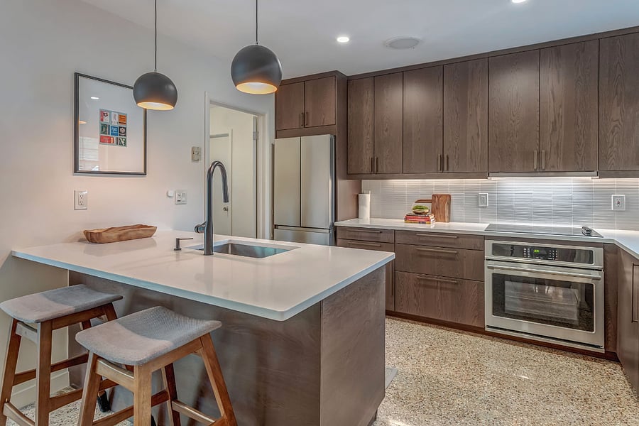 Enjoy a fully stocked kitchen with dishwasher, full fridge, stove, oven, microwave, pantry and so many cabinetry for storage.  