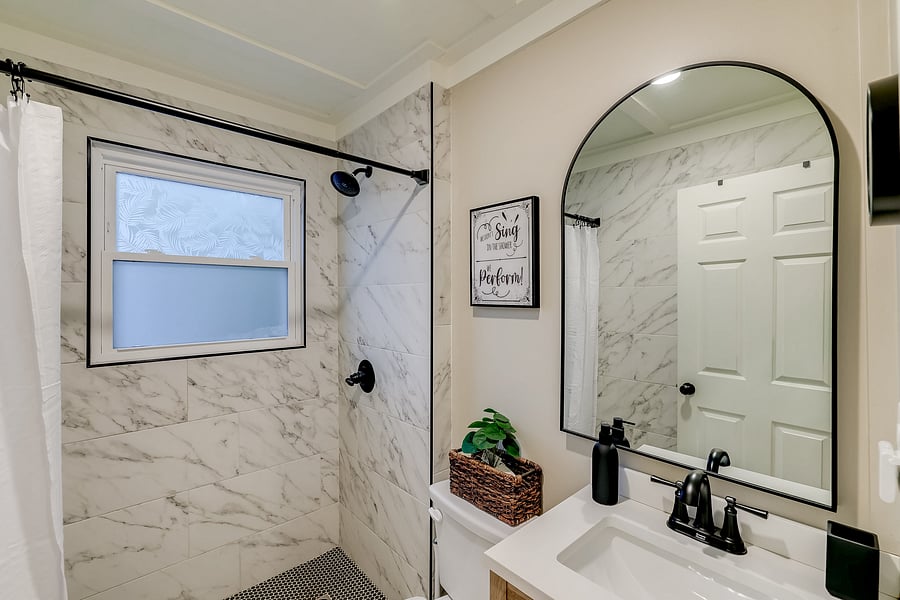 Rejuvenate in this lush full bathroom
