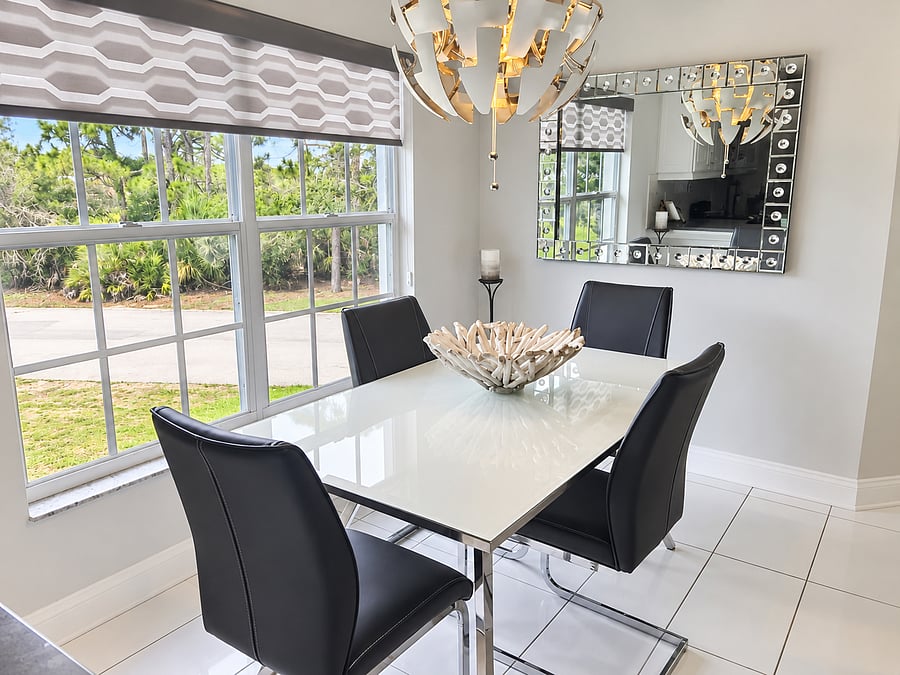 Gather for meals or catch up over dinner in a bright dining area surrounded by natural light.
