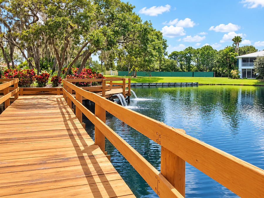 Take a quiet walk along the community boardwalk beside the pond and landscaped grounds.