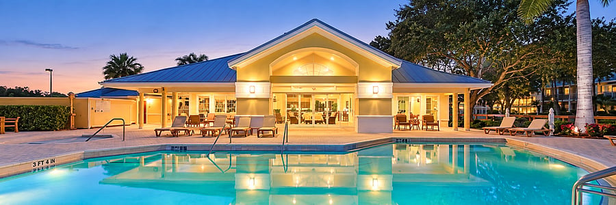 Relax close to home with a community pool and clubhouse surrounded by a tropical Florida setting.
