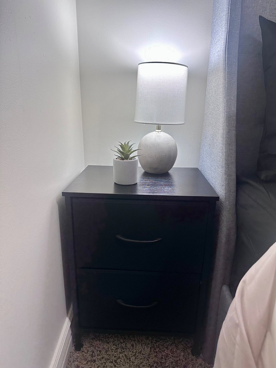 Bedside nightstand with two convenient storage drawers.