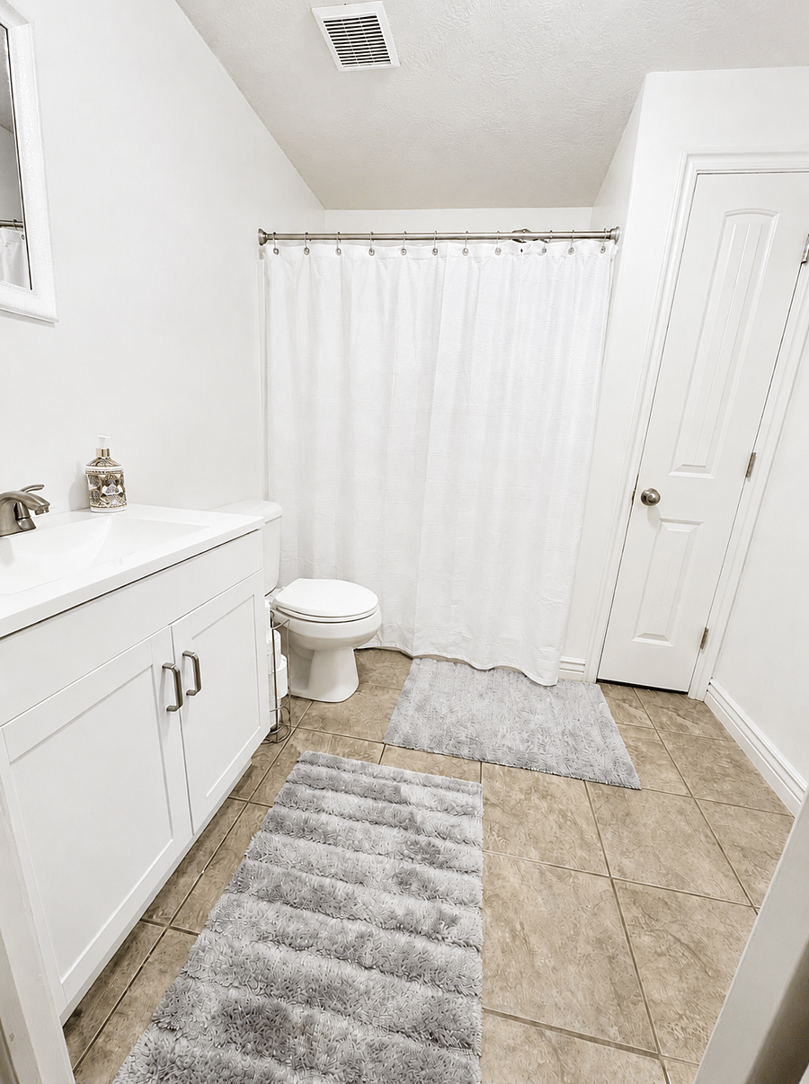 Currently private bathroom with shower/tub combination and vanity storage. Towels, washcloths, and hand soap provided.