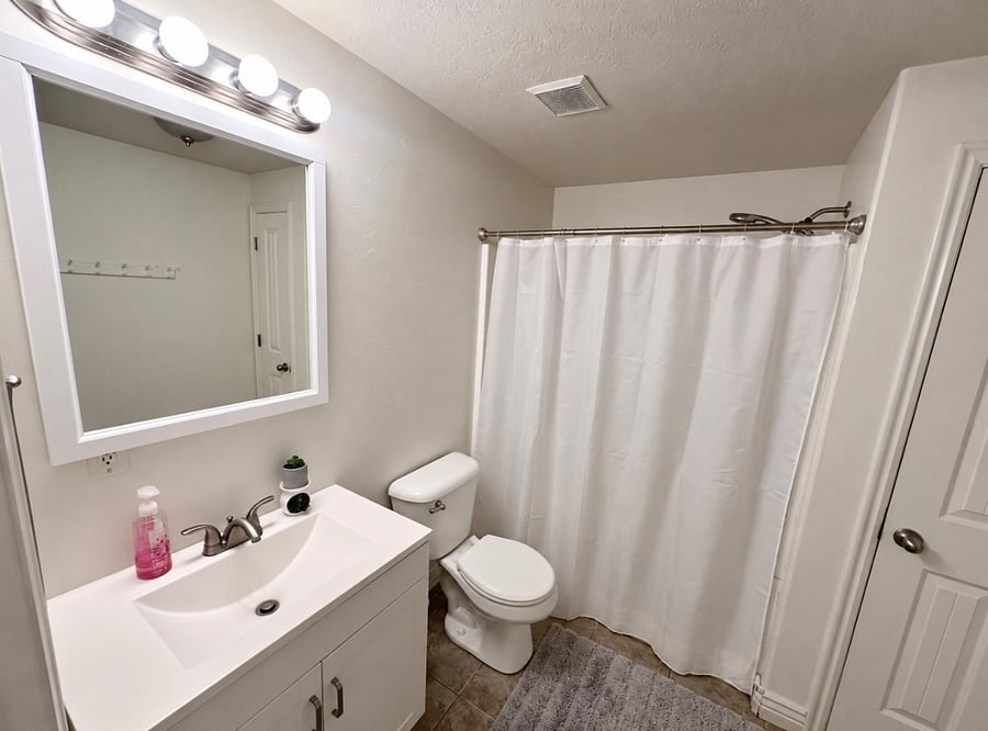 Full bathroom currently shared with one other female tenant