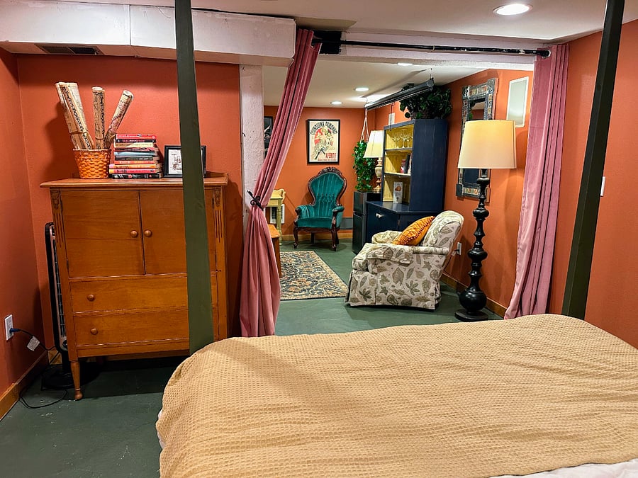 Basement bedroom, view into basement living room