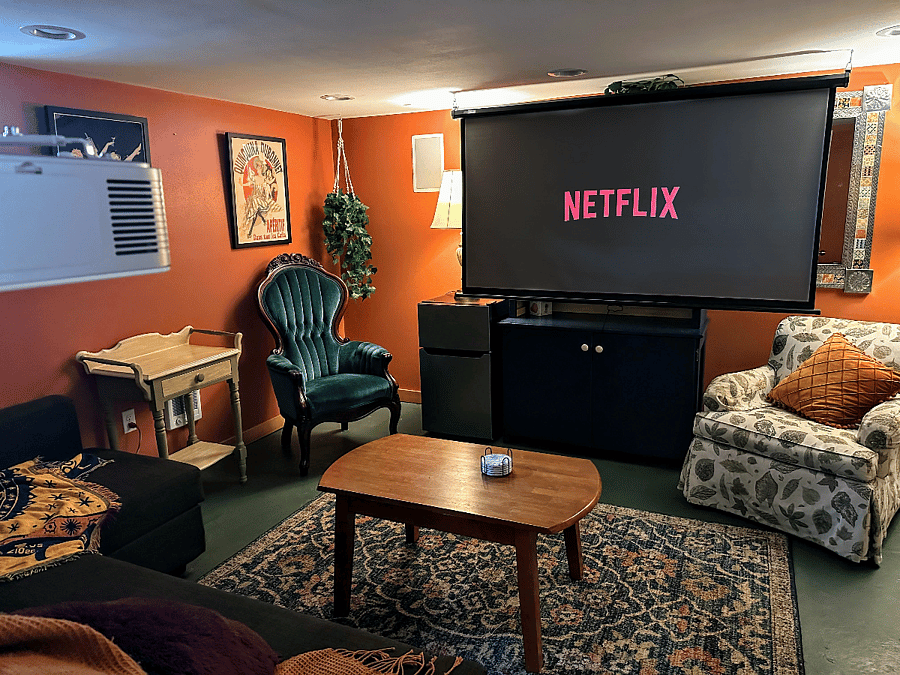 Basement projector and screen, with surround-sound audio system