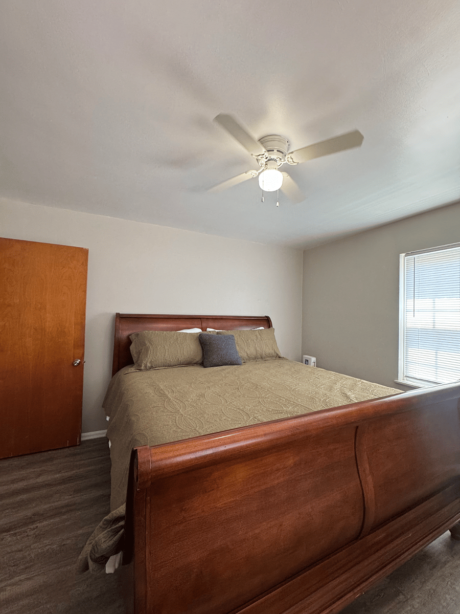 Bedroom - 1: solid wood Queen bed, with lots of natural light
