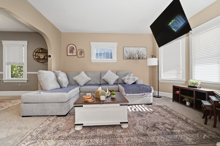 Living Area with smart TV mounted to the ceiling to give you more space.
