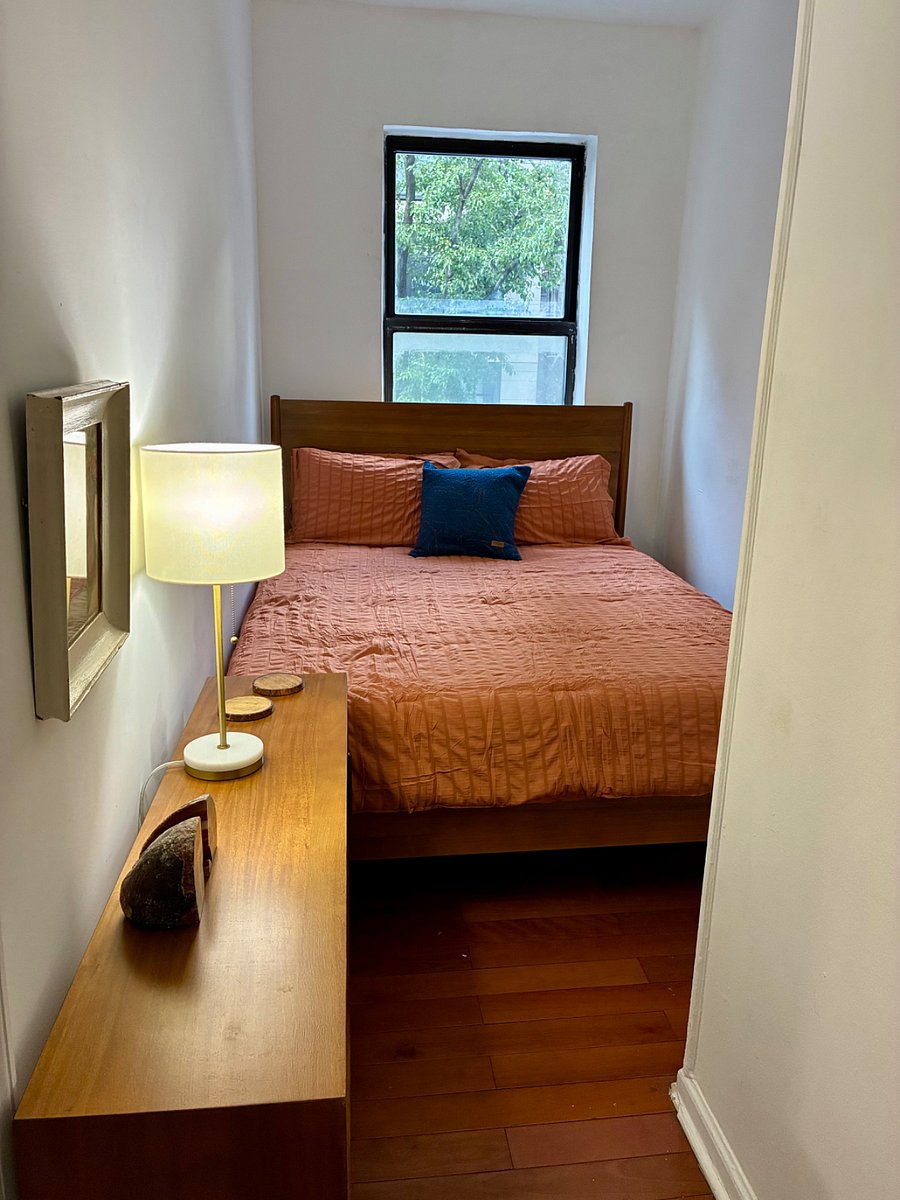 West Elm Queen bed with brand new, never used bedding.  Darkening shades (not shown).  