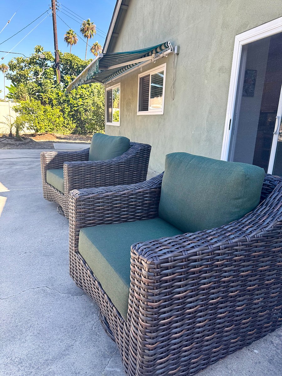 Large outdoor space with chairs to enjoy the back yard.