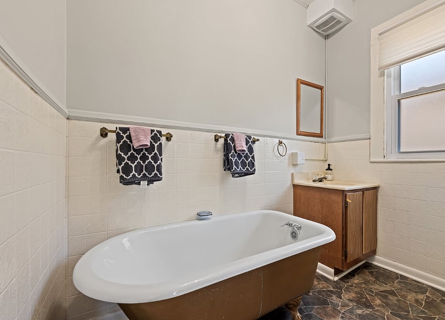 Bath attached to TV room.