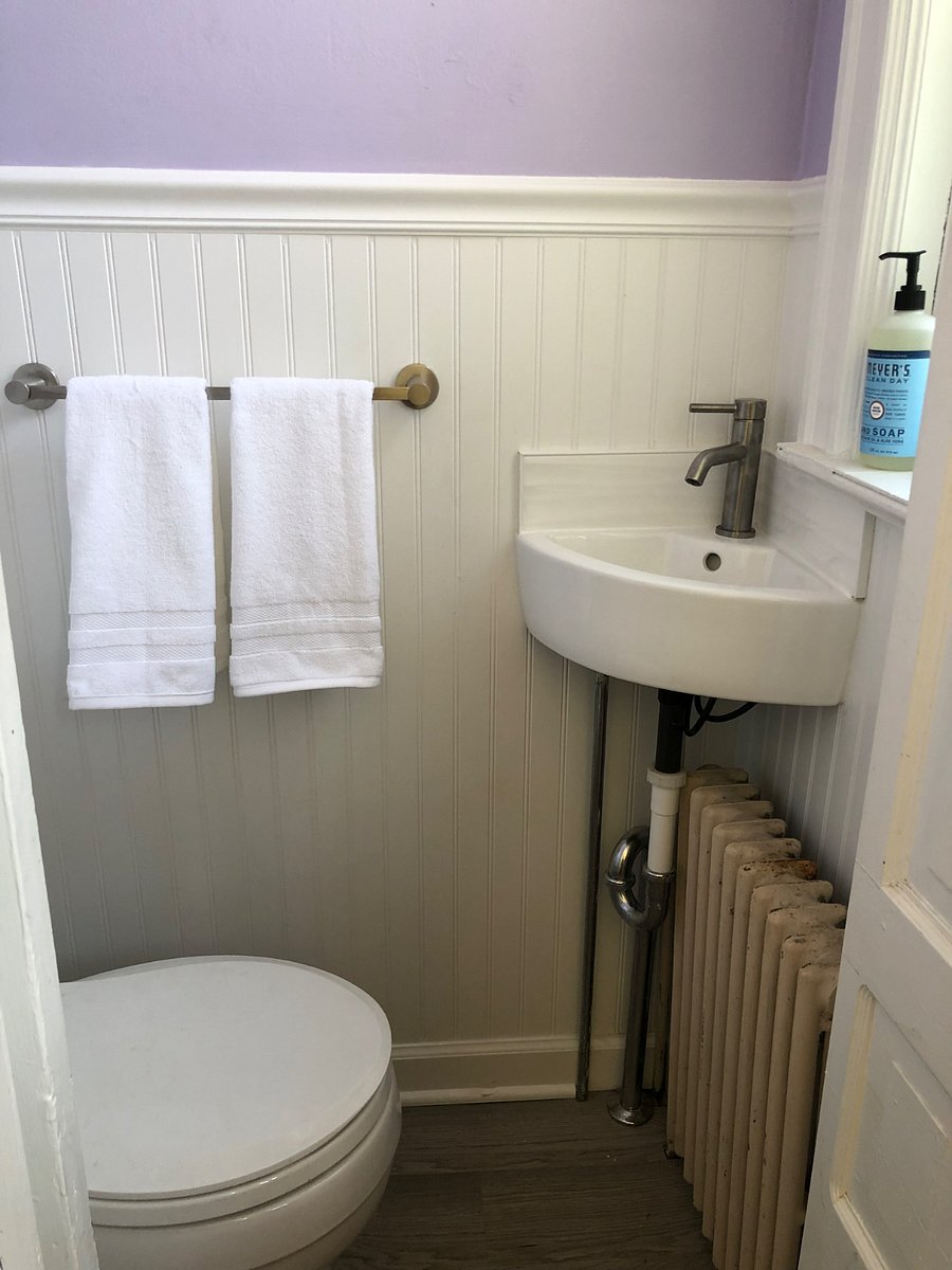 Newly renovated tiny half bath on ground floor