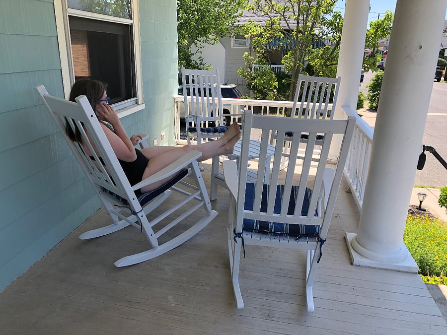 Relax, work, snack or socialize on the roomy front porch.