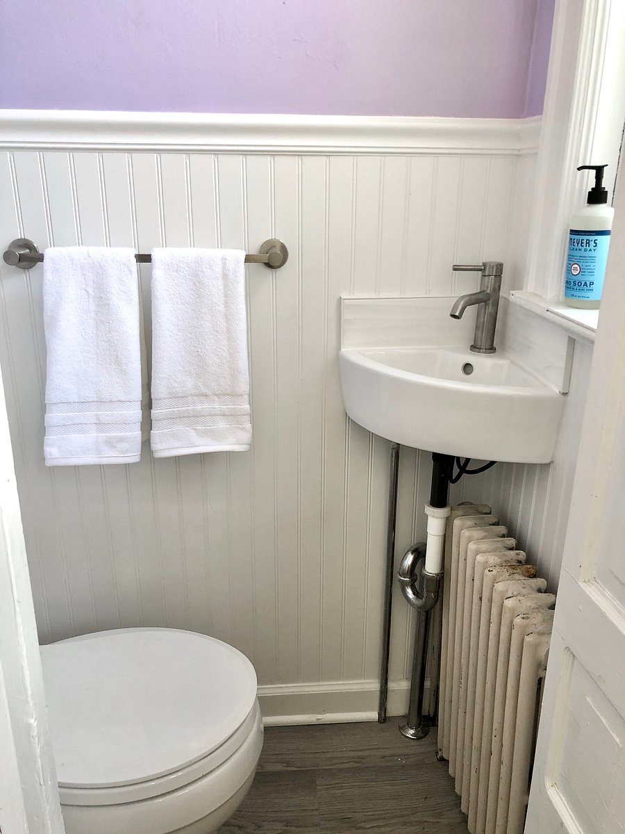 Newly renovated tiny half bath on ground floor