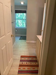 Master bath with 2 sinks and a shower/bathtub.