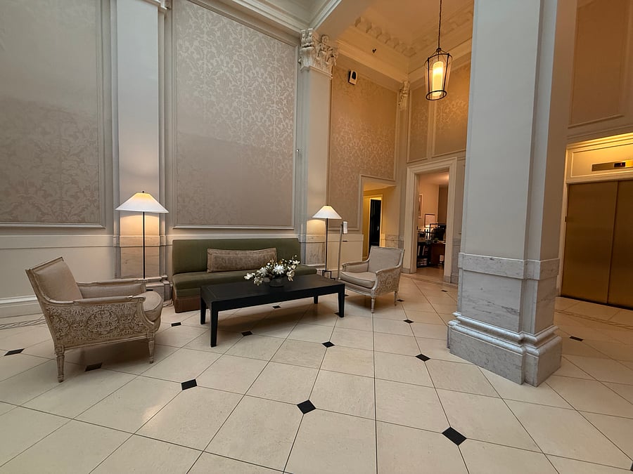 Beautiful foyer with concierge. 