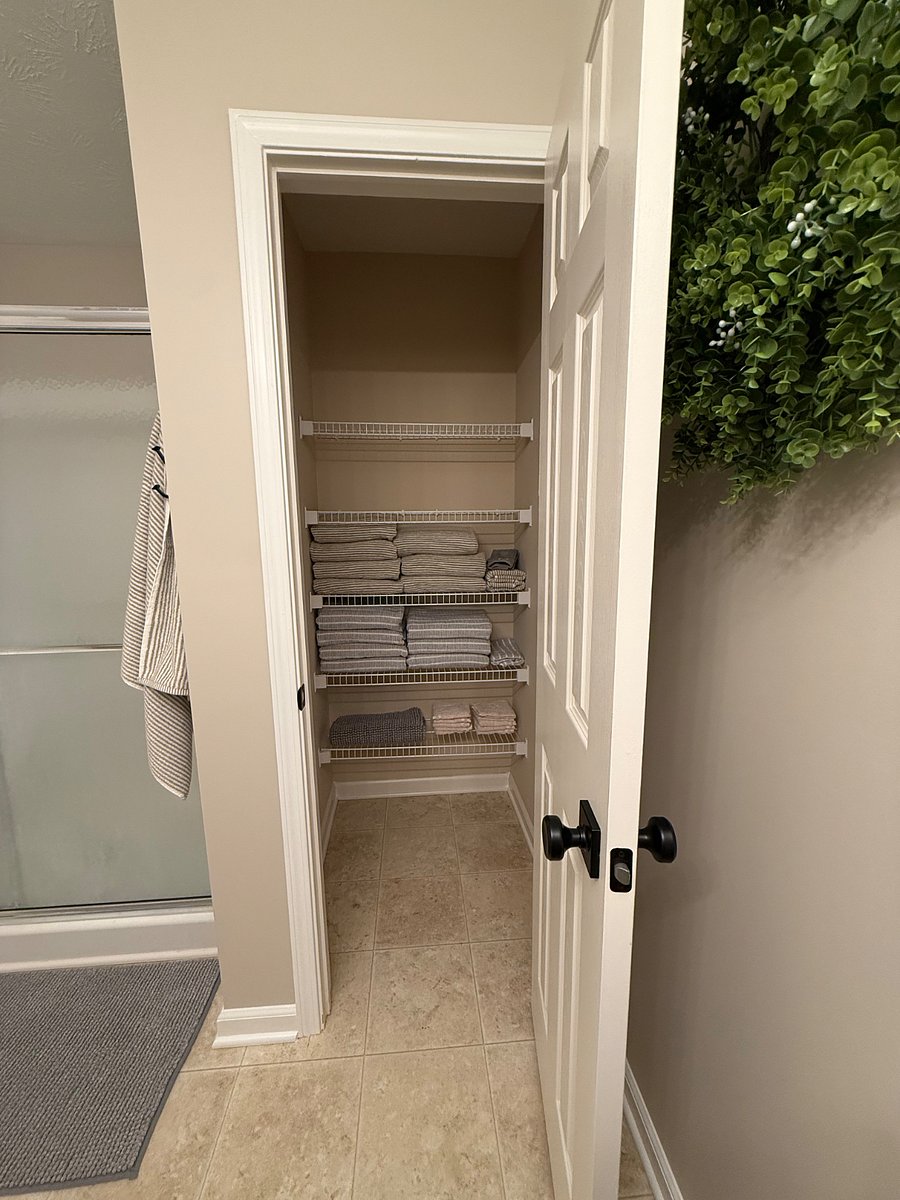 Large linen pantry with towels, hand towels and wash towels.