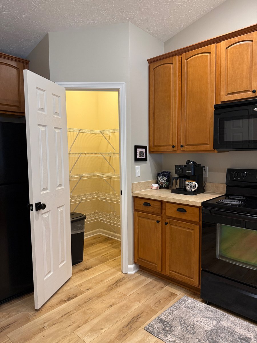 Kitchen with large pantry. 