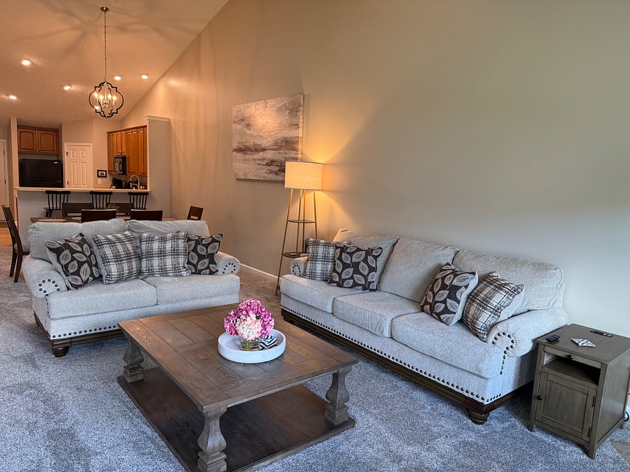 Comfy living room with seating for six people. 