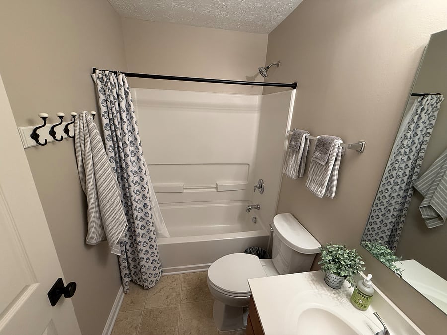 Bathroom with tub/shower combo. 