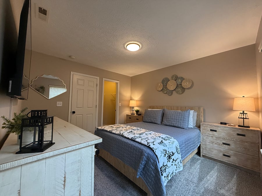 Queen bedroom with walk-in closet. 