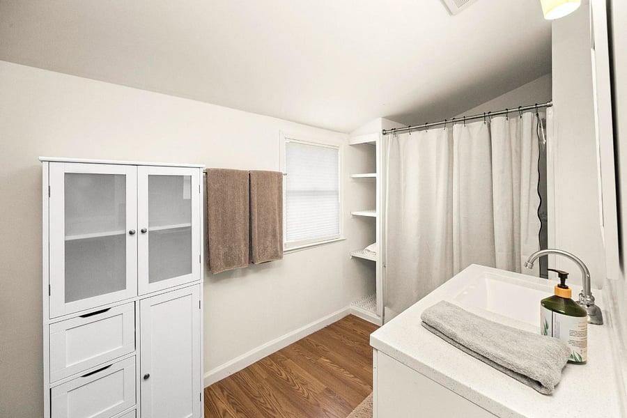 Spacious and practical! Featuring built-in shelving, and towels for added convenience!