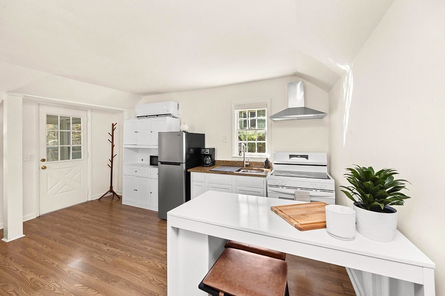 Your all-in-one kitchen setup! Prep, cook, and dine with ease using the island workspace and bar seating!