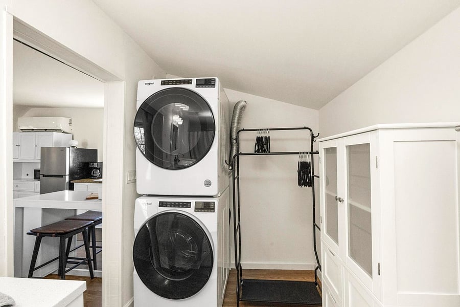 Skip the laundromat! Enjoy a full-size stacked washer and dryer with a nearby rack for easy air-drying!